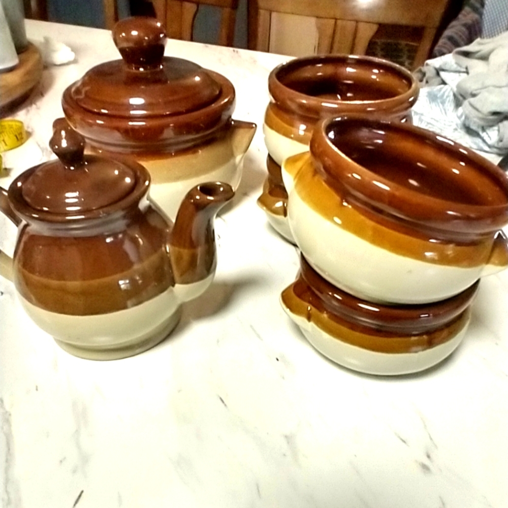 Soup crocks with handles, tea pot with lid, and large bean pot